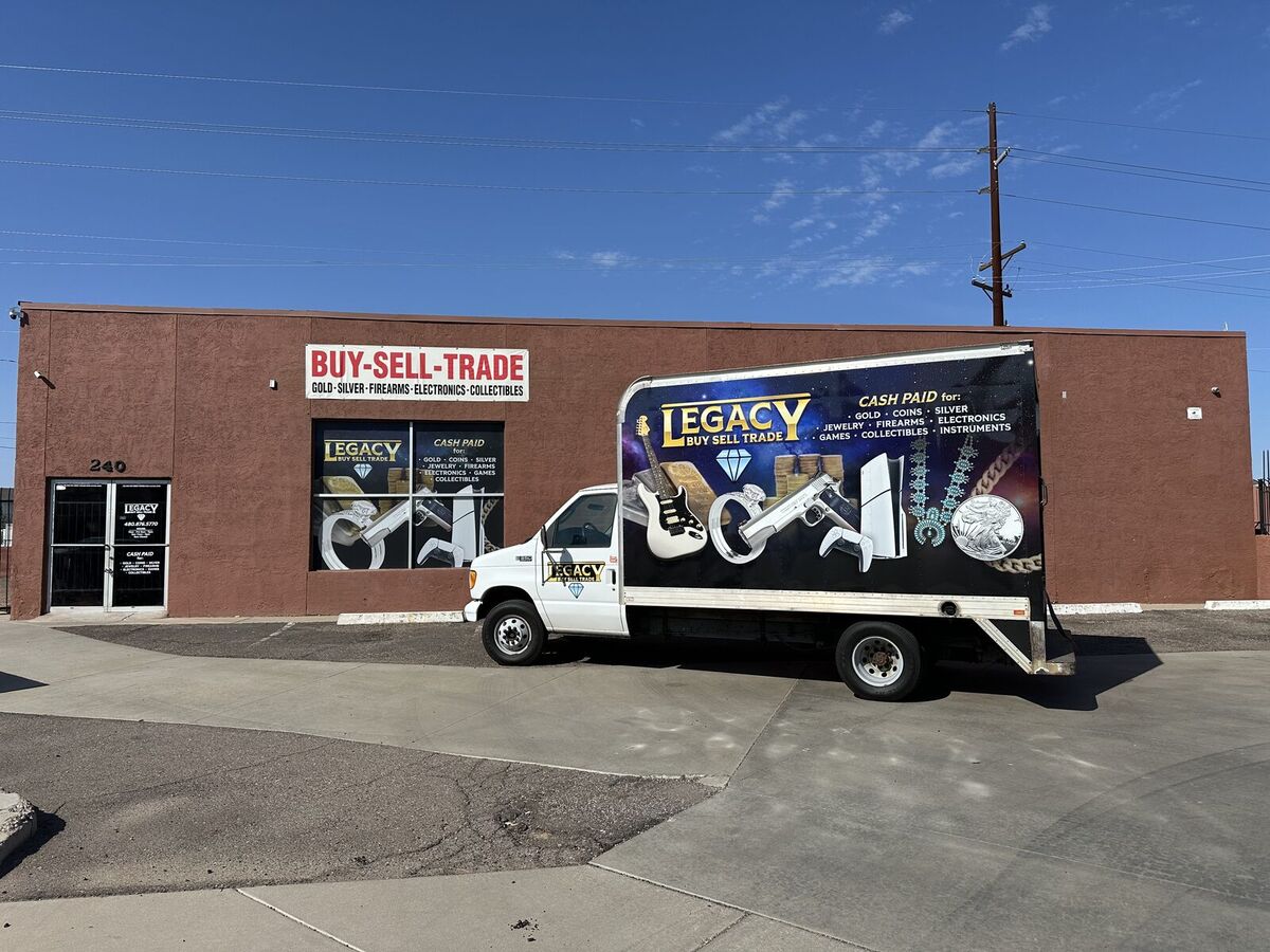 The Legacy box truck parked in front of the shop at 240 N Gilbert Rd, Mesa